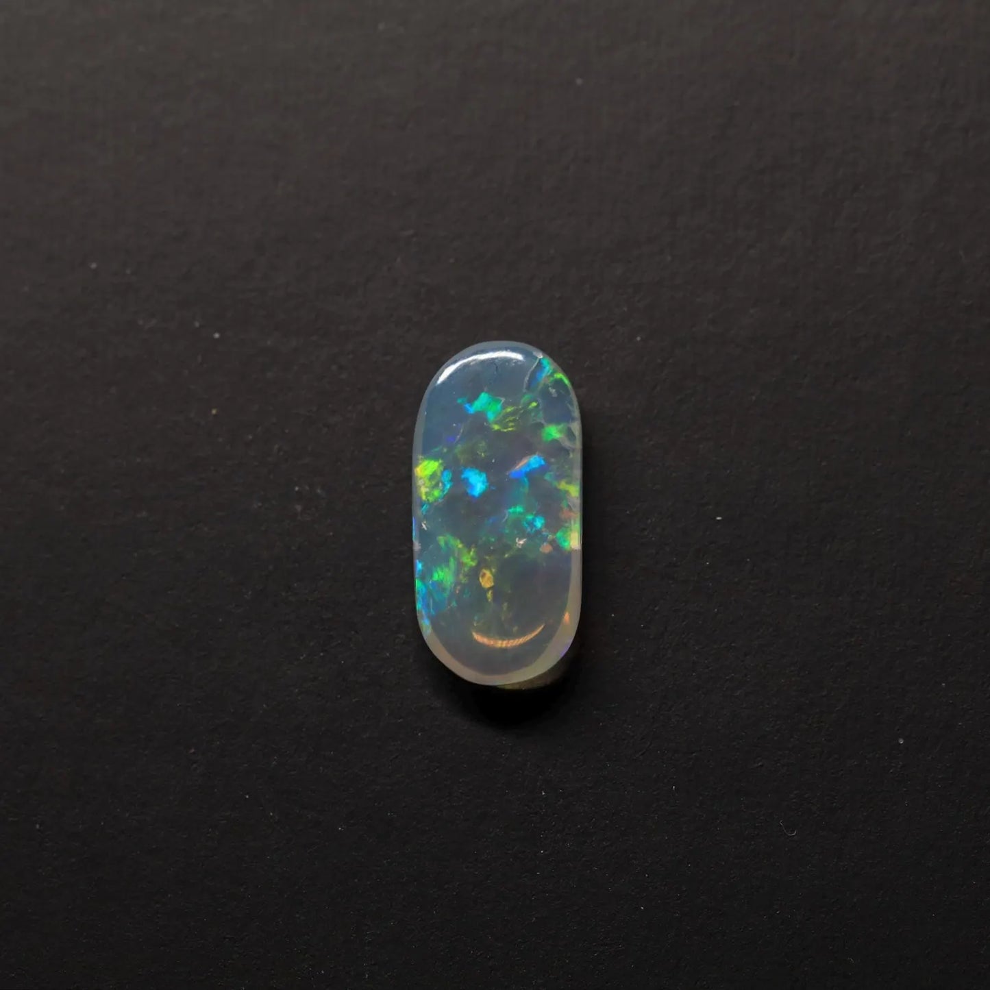 Dark Crystal Opal From Lightning Ridge, Australia
