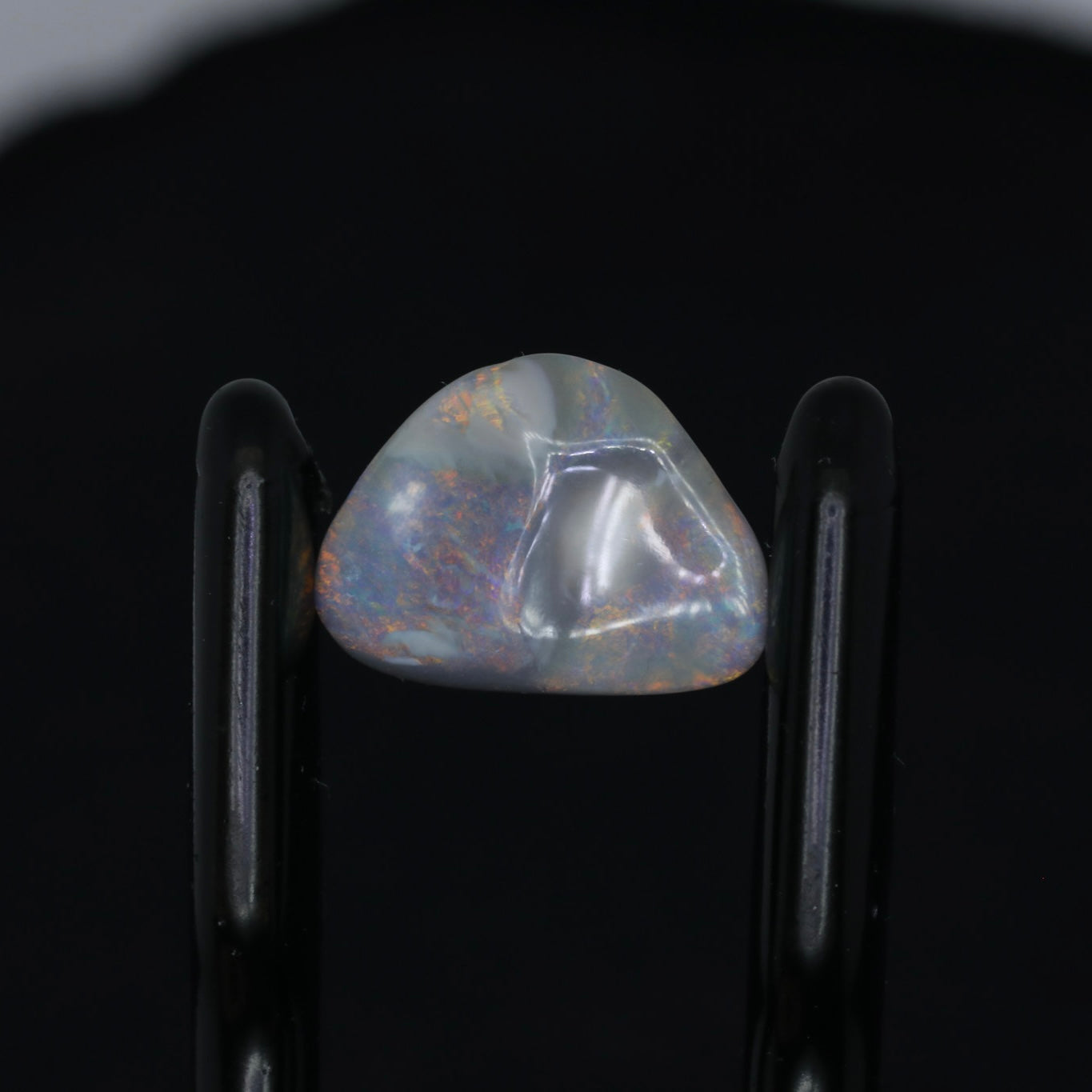 Dark Opal Carving From Lightning Ridge, Australia