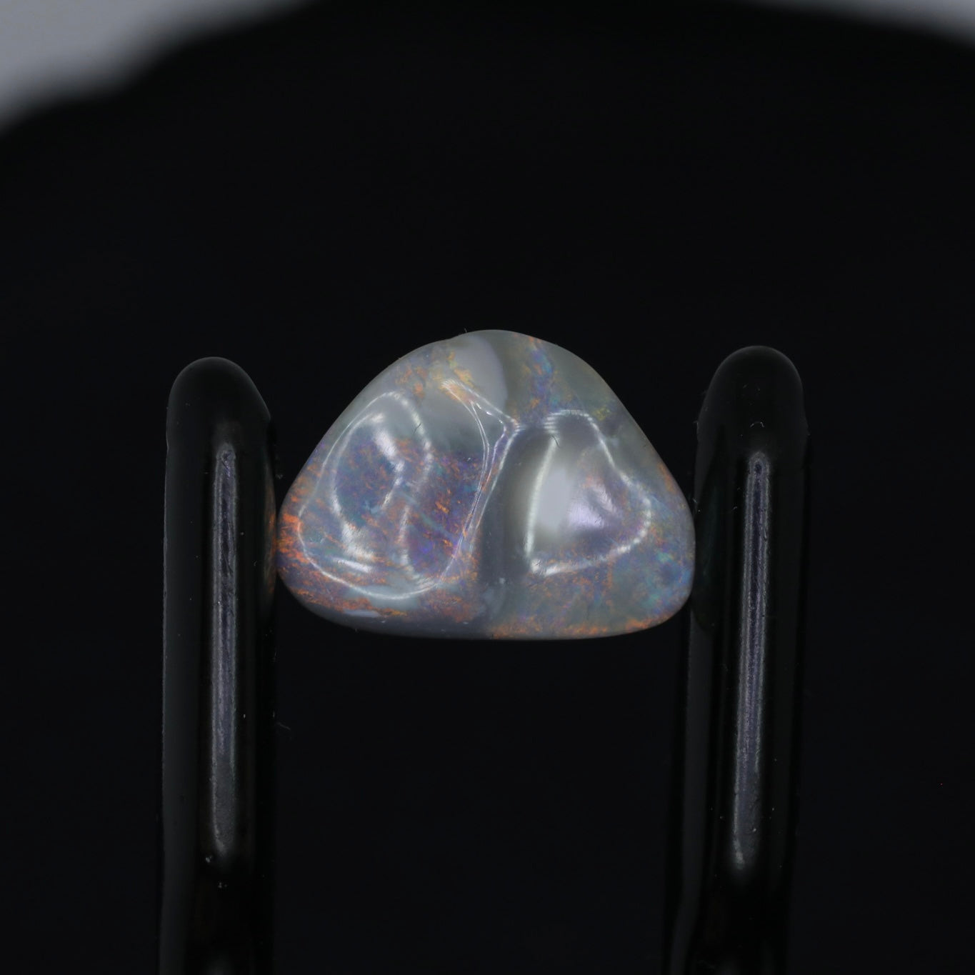 Dark Opal Carving From Lightning Ridge, Australia