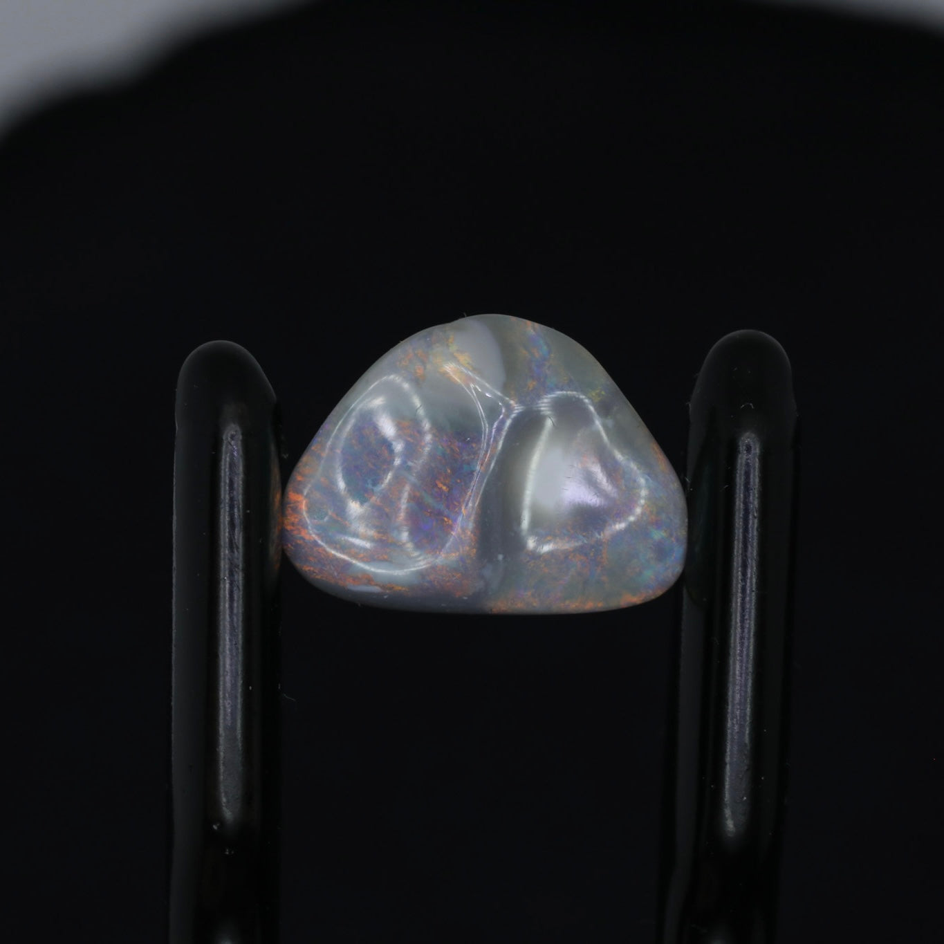 Dark Opal Carving From Lightning Ridge, Australia